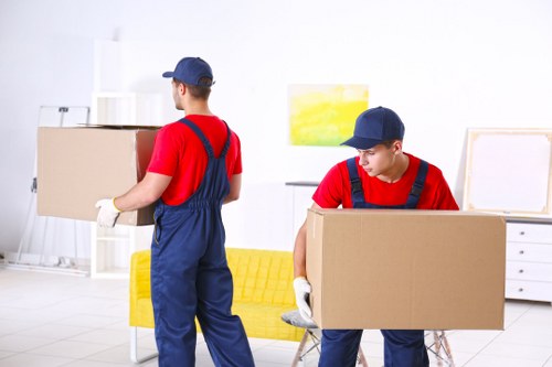 Removal team planning a home move in a London street