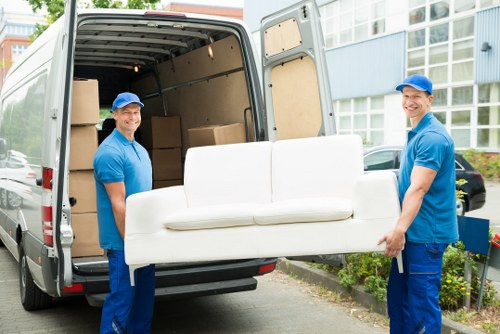 Removal team sorting reusable and recyclable items in London