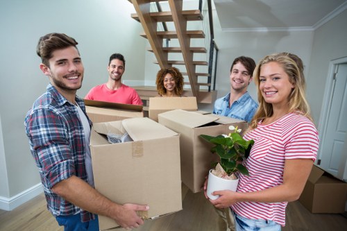 London removal team planning a residential move on a busy street