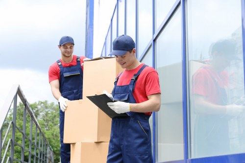 Packed boxes and furniture prepared for a home removal in London