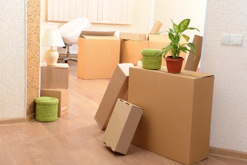 Packing and loading household items into a moving van
