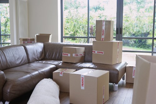 Careful unloading of household belongings during a London removal