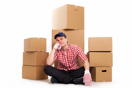 Careful packing of fragile household items in London